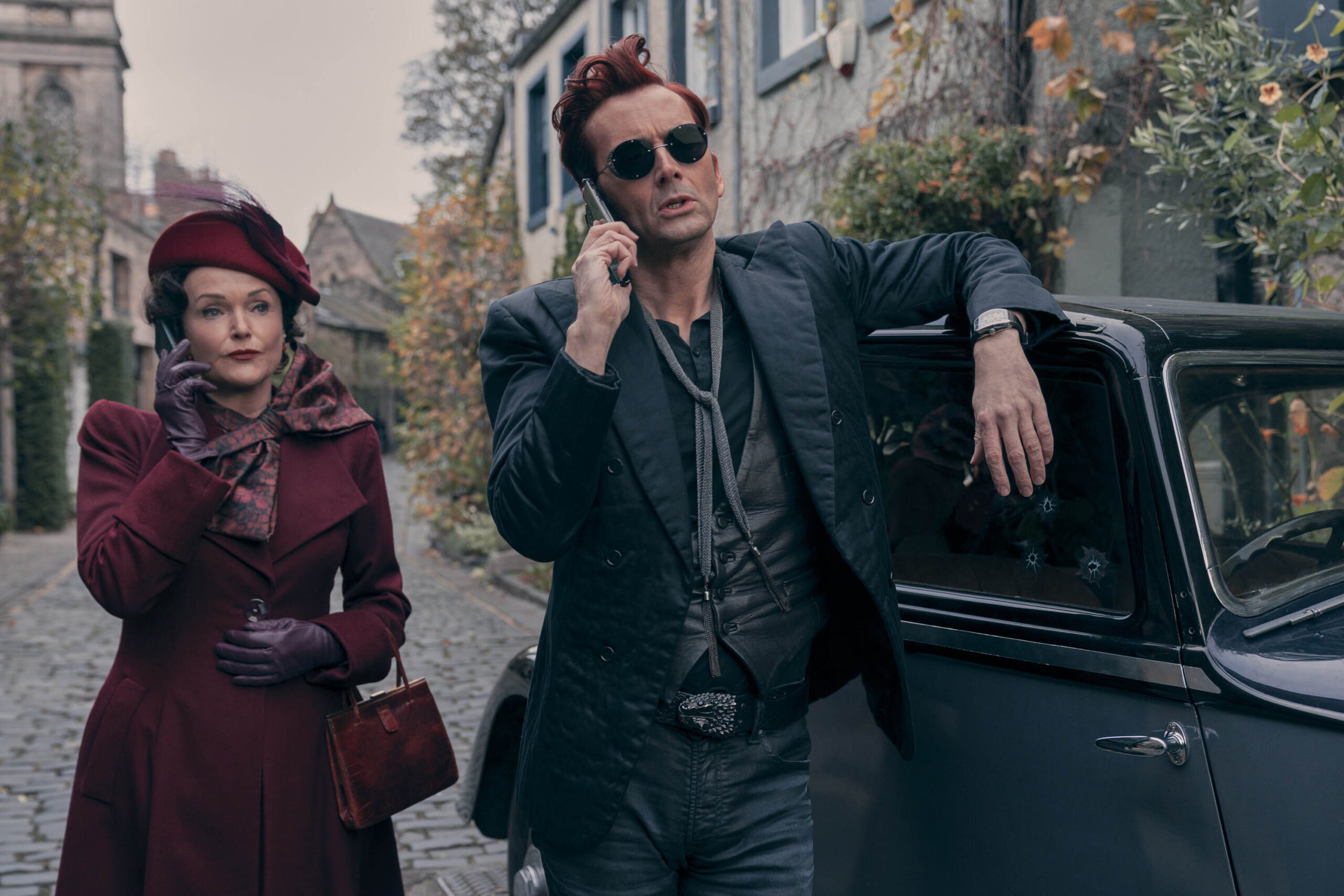 Miranda Richardson (Shax), David Tennant (Crowley) in Good Omens 2x01 [tag: Miranda Richardson, David Tennant] [credit: Copyright Amazon Studios; courtesy of Prime Video]