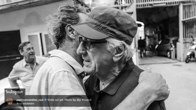 Paolo Sorrentino and hugging Robert De Niro on set in Naples